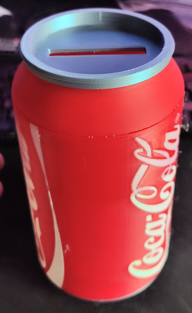 Cola sparegris samlet